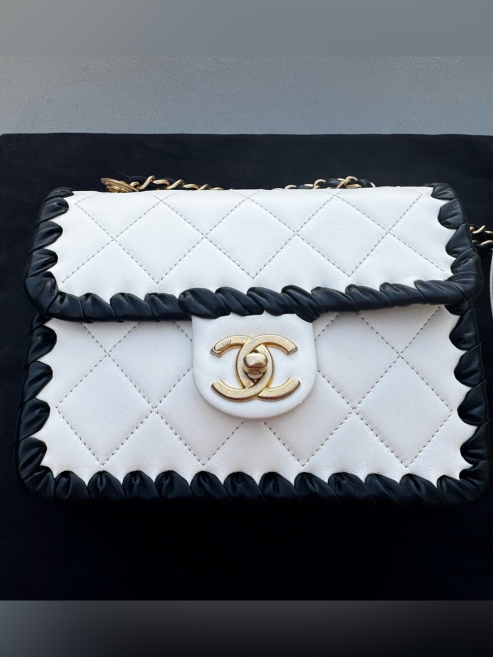 CHANEL Lambskin White & Black Mini Flap Bag with Gold Hardware